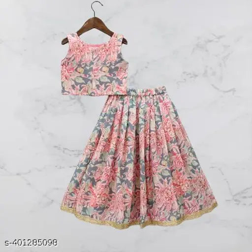 Rayon lehenga-choli with floral print and acrylic dupatta, sleeveless for kids' parties, available in various sizes from 3-4 years to 11-12 years. Indian traditional wear on display