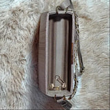 Women's embroidered sling bag, brown material with zip closure