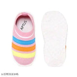 Pink and white sneakers with rainbow stripes, children's music shoe