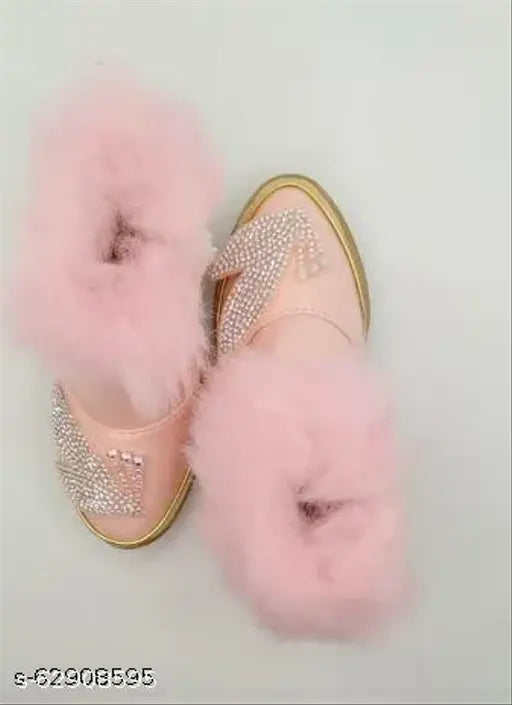 Pink canvas and PU party wear shoes for infants, age 1 month to 2.5 years, available in pink, black, coral with multiple designs. Soft and attractive for parties. Size options include: 6 Months (10.3cm), 8 Months (11cm), 10-12 Months (11.4cm), 1 (11.7cm), 1.5 (12.1cm), 2 (14.1cm), 2.5 (14.7cm), 6-9 Months (10cm), 9-12 Months (10.2cm), 12-15 Months (12cm), 15-18 Months (12.5cm), 18-21 Months (13.2cm), 21-24 Months (14.3cm), 2-2.5 Years (15.3cm), 2.5-3 Years (16cm). Made in India