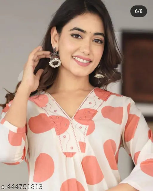 Stylish cotton polka print kurti pant set with three-quarter sleeves, embroidered pattern for women. Available in various sizes M-XXXXL. Made in India