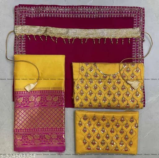 Pink art silk half saree for girls, embroidered unstitched lehenga with net dupatta and sleeveless blouse, Indian traditional attire accessorized with tussled edges and belt