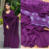 Purple chiffon saree with fringe ends, worn over a black bodysuit