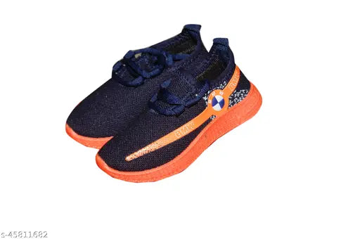 Orange and black kids sports shoes with orange laces