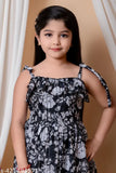 Black and white floral maxi dress with cold-shoulder sleeves, knee-length