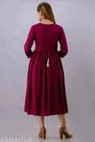 The image depicts a long, sleeveless dress with embroidery, possibly viscose or rayon material, in a darker shade such as burgundy or maroon. It appears to be a women's garment with a V-neckline and an A-line silhouette. The bottom hem is not fully visible, but it seems to fall straight down from the waist