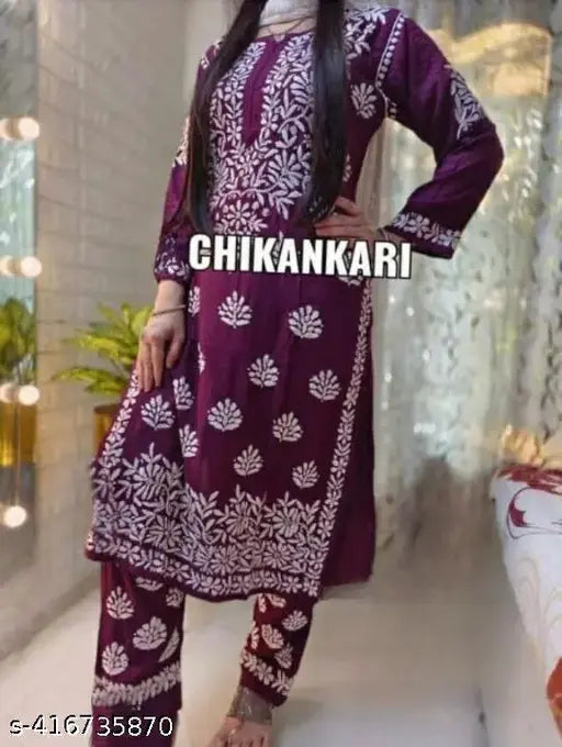 Embroidered net rayon kurta set with matching pants, RUTBA 18 chikankari work on display