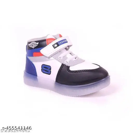 Trendy kids shoe with blue and red accents, velcro strap