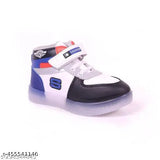 Trendy kids shoe with blue and red accents, velcro strap