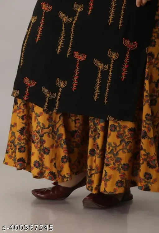 Black kurta, matching sharara, with paisley print and flared skirt