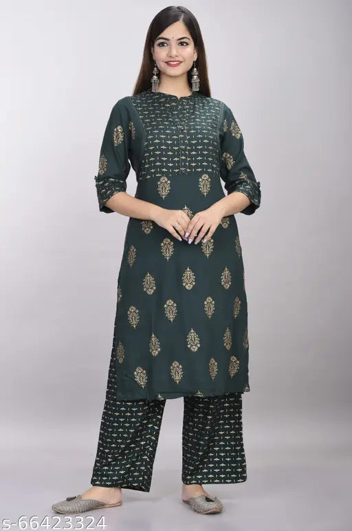 Stylish women's rayon kurta and palazzo set with three-quarter sleeves, printed net pattern. Single size options M, L, XL, XXL for traditional festive wear. Indian origin