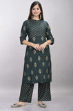Stylish women's rayon kurta and palazzo set with three-quarter sleeves, printed net pattern. Single size options M, L, XL, XXL for traditional festive wear. Indian origin