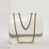 White sling bag with gold accents, zipper closure, trendy fashion accessory