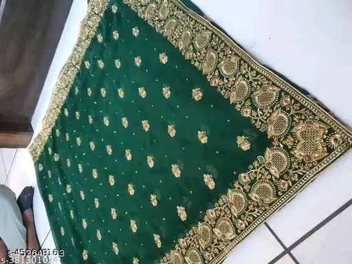 Green georgette saree with heavy embroidery and full stone work