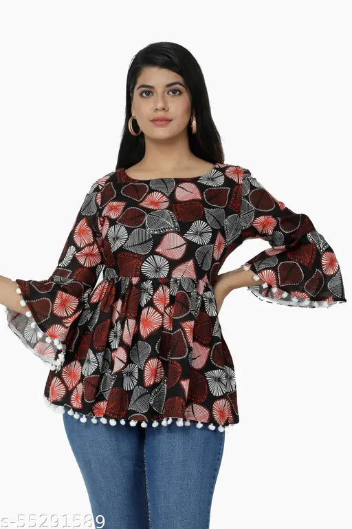 Women's printed cotton top, three-quarter sleeves, vibrant Indian folk art pattern. [Color may vary due to print]