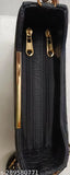 Womens black slingbag handbag with shoulder strap and main compartment