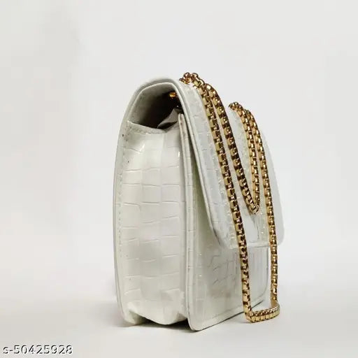 White leather sling bag with multiple pockets and adjustable strap