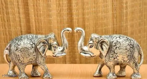 Silver-plated decorative metal elephant pair for Diwali/Puja decor, Indian craftsmanship, 7cm L x 10cm H x 16cm B