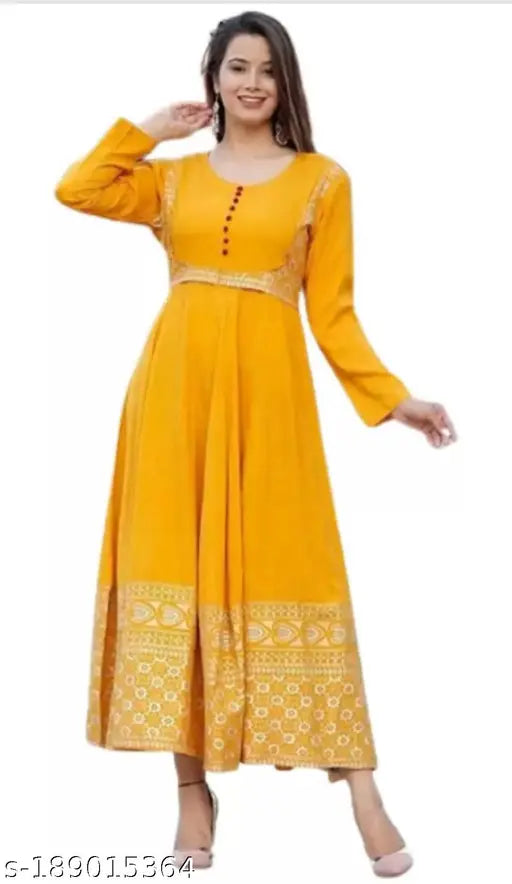 Yellow rayon anarkali kurti with pink dupatta, plus size for Haldi and Mehndi ceremonies. Stylish three-quarter sleeves print design. Perfect for daily wear and special occasions. Indian brand LEELA Emporium Jaipur