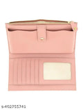 Hot pink clutch wallet with multiple card slots and a white tag