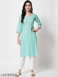 A person wearing a light green zigzag print straight kameez