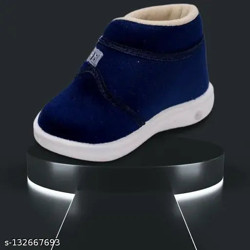 Blue velvet slippers for kids with a whistle on top