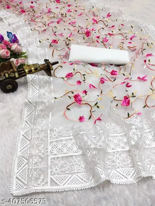 Pink net saree with embroidered blouse, traditional Indian fashion for summer weddings and parties