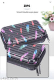 Multi-colored, leaf print fiber mini suitcase with adjustable strap