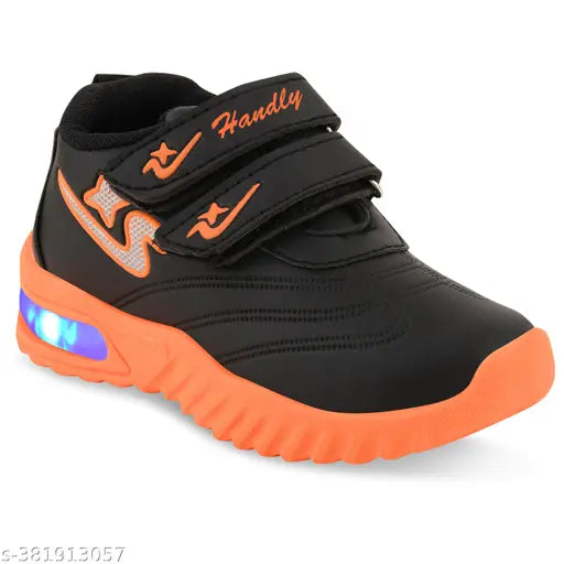 Orange and black sports shoes with orange glow lights, velcro straps, for outdoor activities, designed for little kids