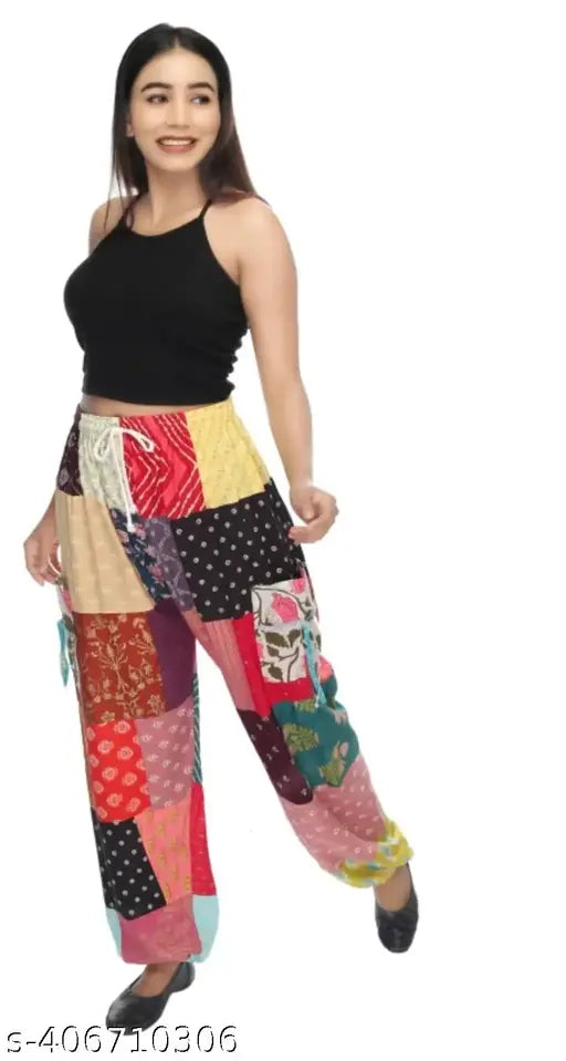 Multi-colored patchwork harem pants with wide legs, suitable for yoga or casual wear, made of pure cotton material