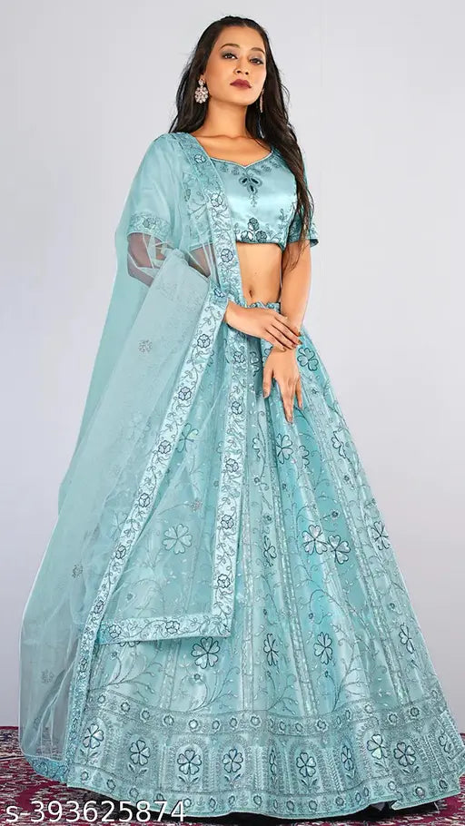 Elegant sky blue net semi-stitched Lehenga Choli with matching dupatta, embellished with gold zari work embroidery - Indian wedding attire