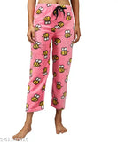 Pink pyjama bottoms with honeycomb pattern, likely cotton, casual style