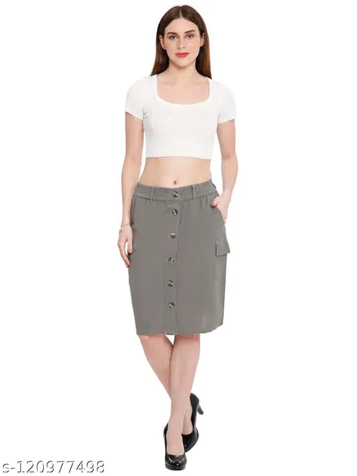 Grey denim skirt with white top, belt loops