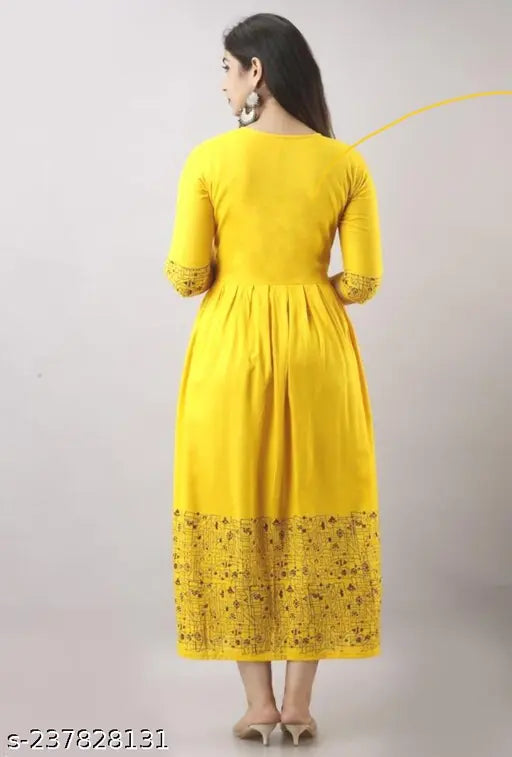 Women's long, printed rayon kurta with yellow border and flared skirt