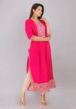 Red kameez with embroidery on a white background
