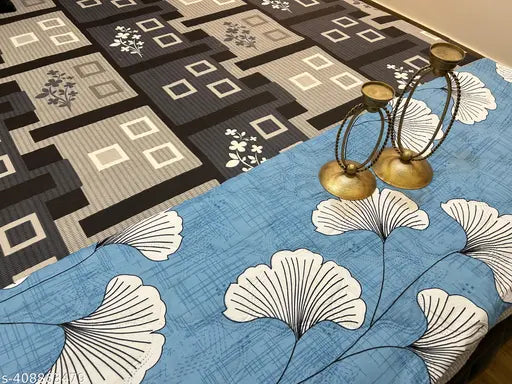 Dash patterned quilt with blue and white hues