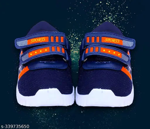Orange and black casual shoes with Velcro straps and lightweight design, suitable for outdoor sports