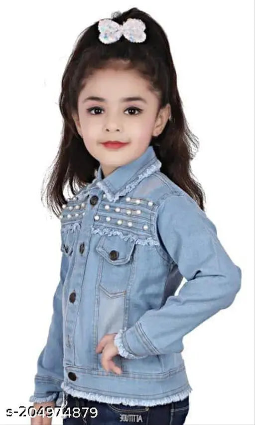 A young girl in a front light blue denim jacket, posing against a white background