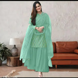 Teal saree with matching blouse and pallu, traditional design
