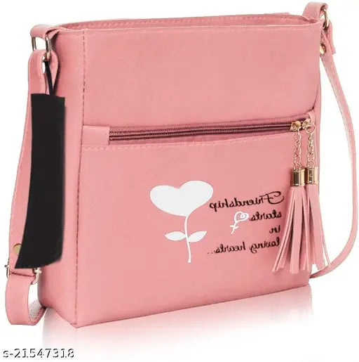New stylish pink sling bag with tassel, black zip closure