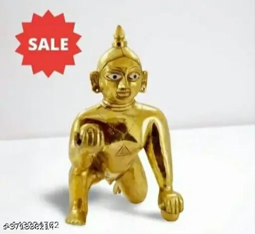 Golden Gopal idol with gold clothing