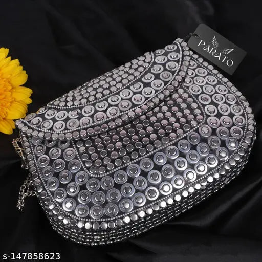 The Parato Handmade Trendy Classy women's slingbag. Silver chain with large rhinestone beads and smaller studded details. Ideal for weddings, parties, or daily use