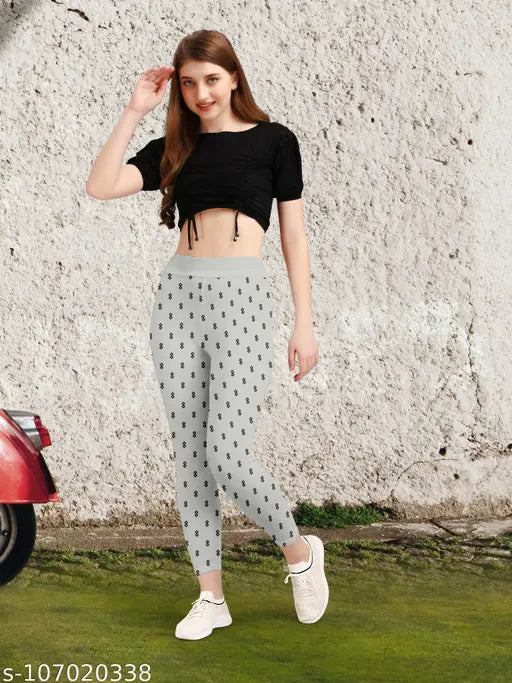 Cotton blend printed jeggings for women and girls, slim fit and high rise, ankle length, dry clean only. Small sizes: 26 (waist 28in, length 35in), 28 (waist 30in, length 35in), 30 (waist 32in, length 35in), etc. Made in India