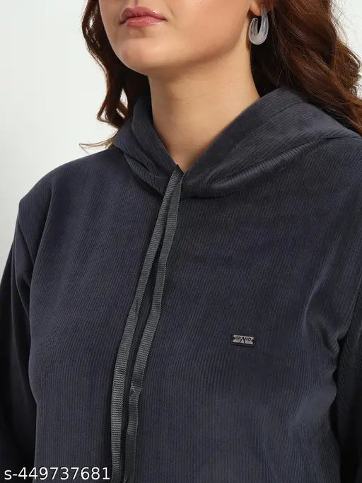 Grey corduroy unisex kangaroo pocket hoodie with drawstring, velvet sleeves, solid pattern, and relaxed fit. Made in India