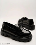 Black patent leather loafers for girls, detailed with chain accents - casual footwear accessory in solid net display