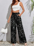 Womens fashion bell bottom pants, solid black trousers with a slight flare. High waistband and elastic waist, suitable for casual wear or summer events