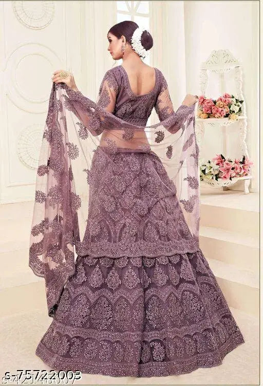 Wine Chikankari net lehenga-choli and dupatta set, intricately embroidered Indian bridal wear