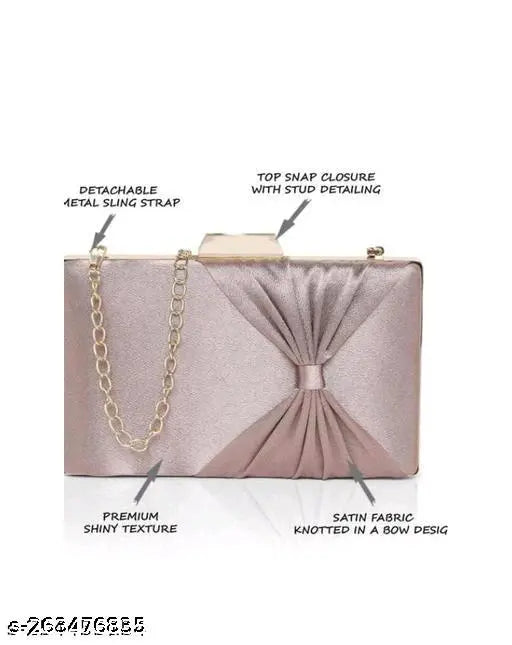 Metal silver sequin party clutch with a bow