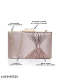 Metal silver sequin party clutch with a bow