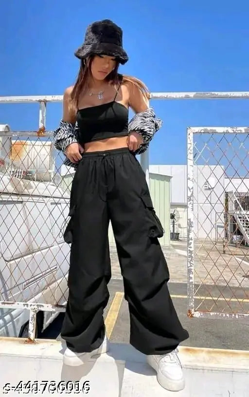Black cargo pants with side pockets and tie closure